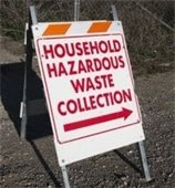 Sign pointing towards Household Hazardous Waste Collection